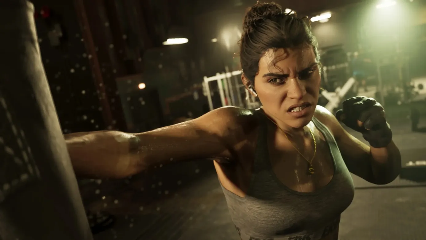 Lucia Caminos en combat en cage — visuel officiel Rockstar Games